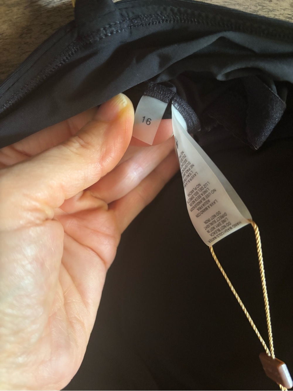 Classic Black One-Piece Swimdress with Gold Accents - Picture 5 of 7